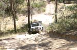 07-Plenty of dust flying as we head up the hill