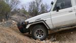 21-Bill crosses a rebulilt a creek bed
