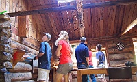Bryan &#38; Jeanette check out the writings on the wall at Moscow Villa