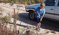 Campbell checks out the &#39;Disputed Country&#39; sign